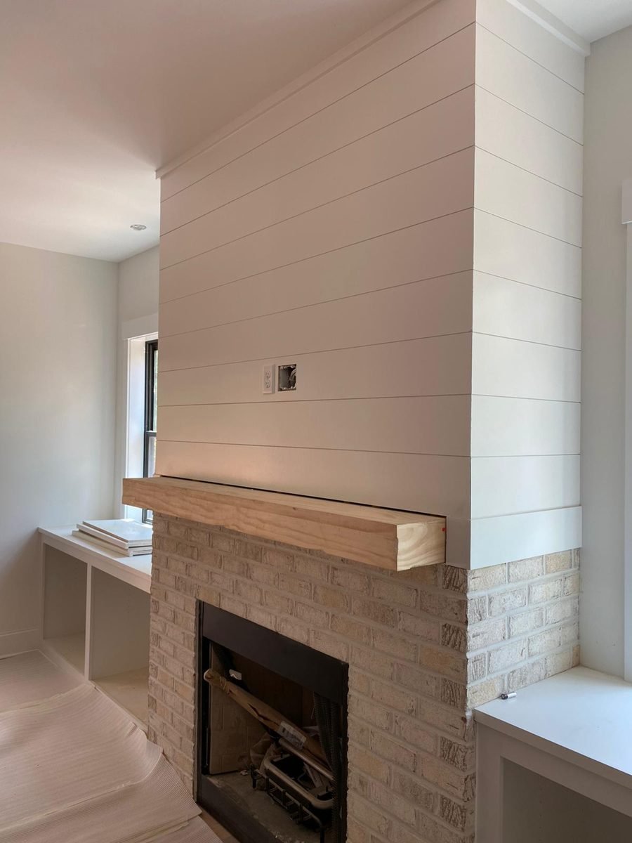 Fireplace with shiplap wall