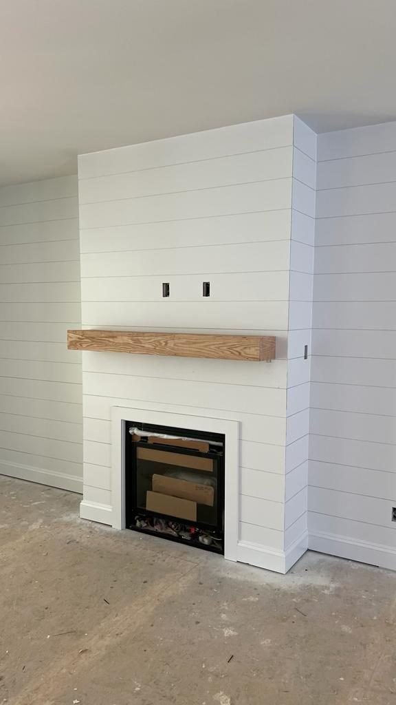White shiplap fireplace