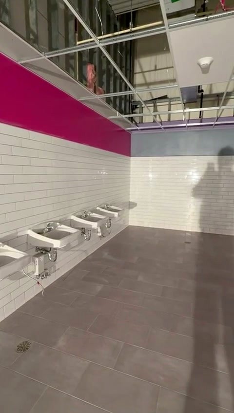 Commercial bathroom, fixtures row
